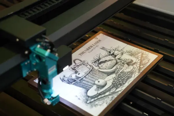 Titan-63-100W-RF-Tube-CO₂-laser-machine-is-engraving-a-high-resolution-photo-600x400.png
