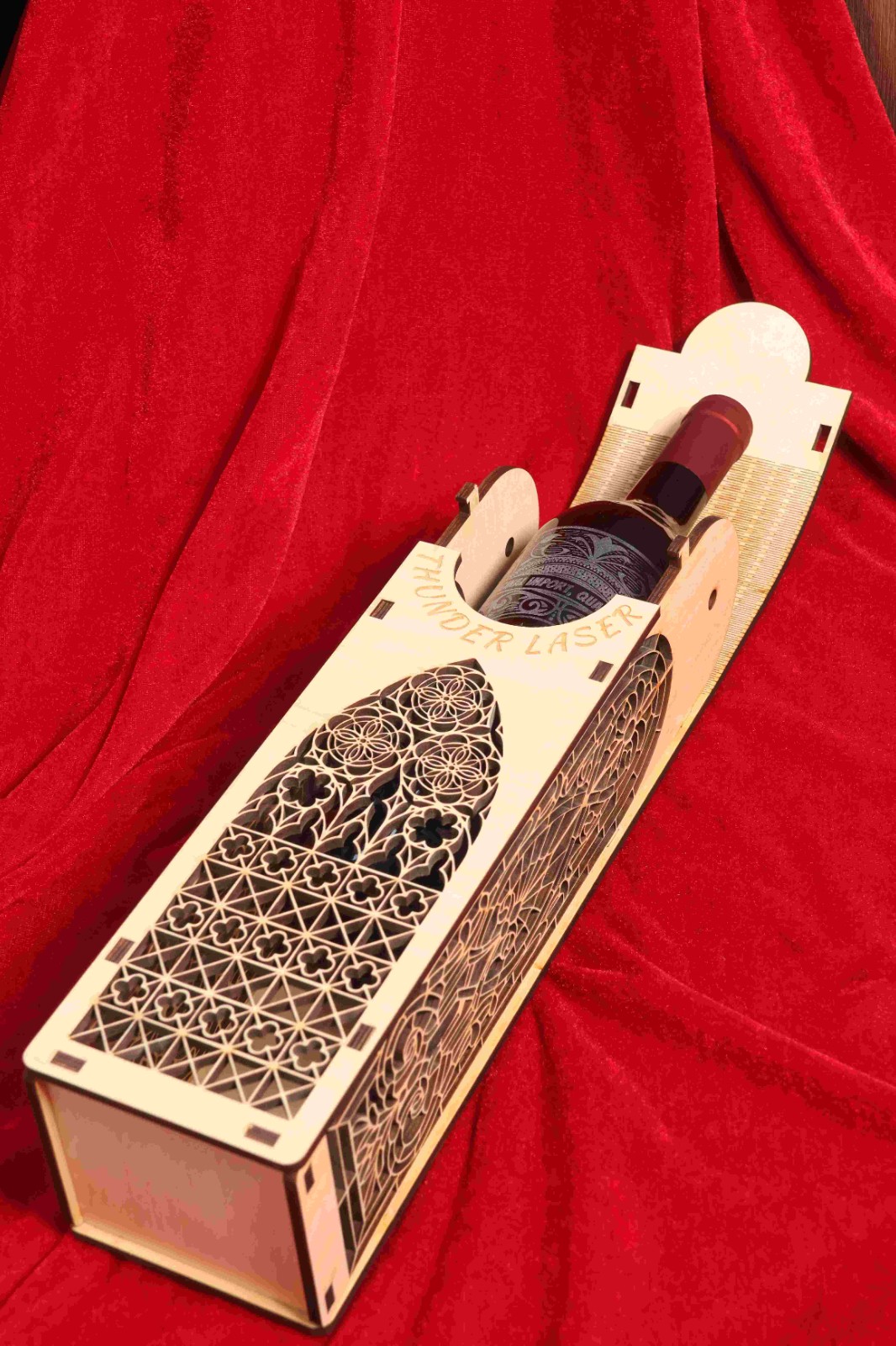 An image showing a laser-cut template used to create a wine bottle packaging product