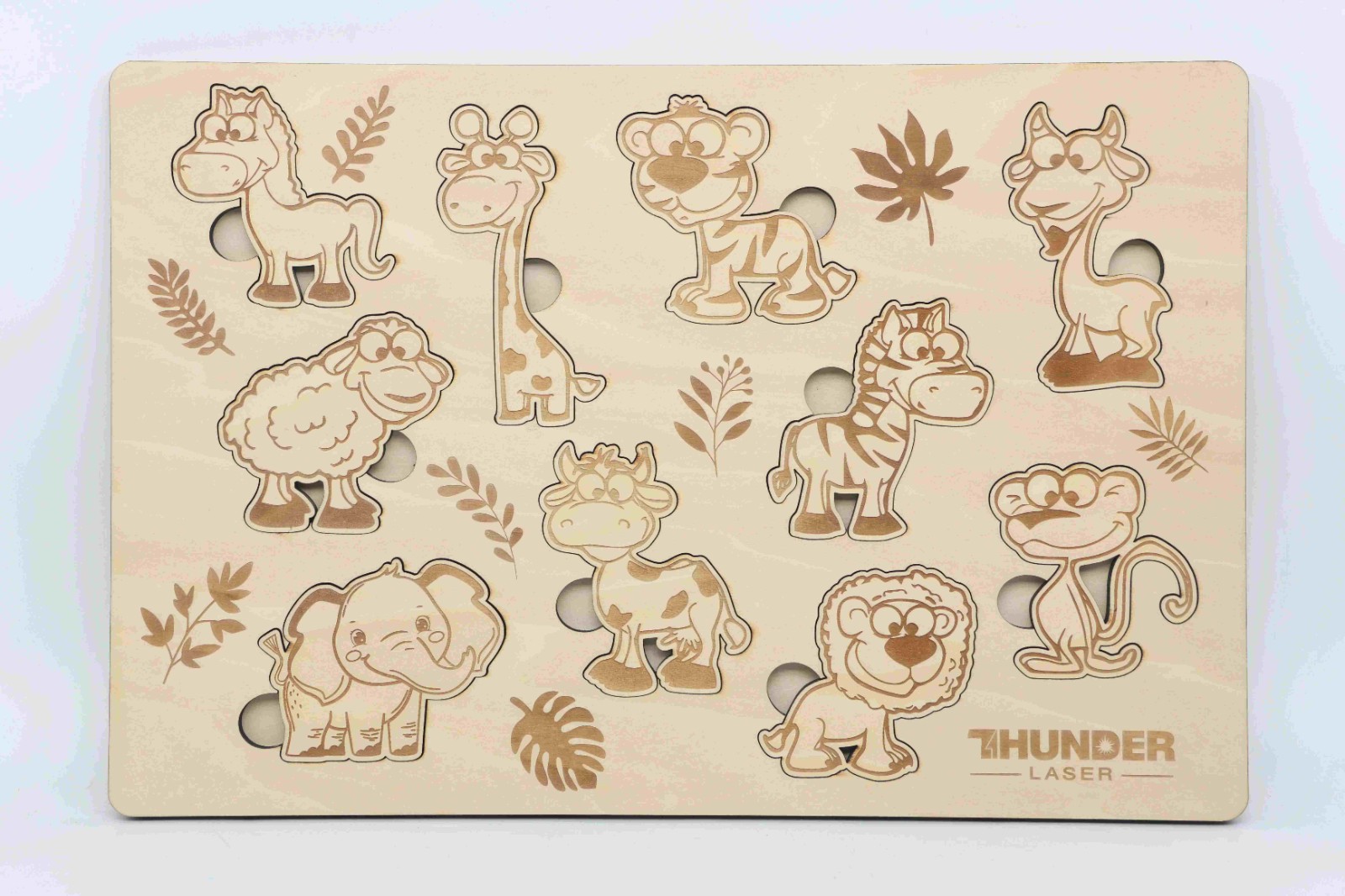 A laser-cut wooden educational puzzle board