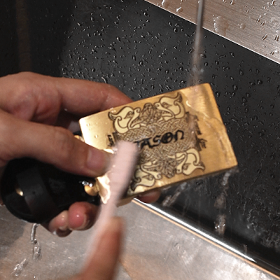 Wash-the-laser-marked-brass-belt-buckle-with-water-and-a-toothbrush.png